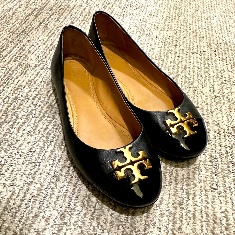Authentic Tory Burch black ballet flats with gold signature hardware, size 8.